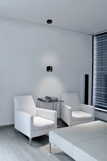 Hanging Clippo Pendelleuchte schwarz in einer Leseecke